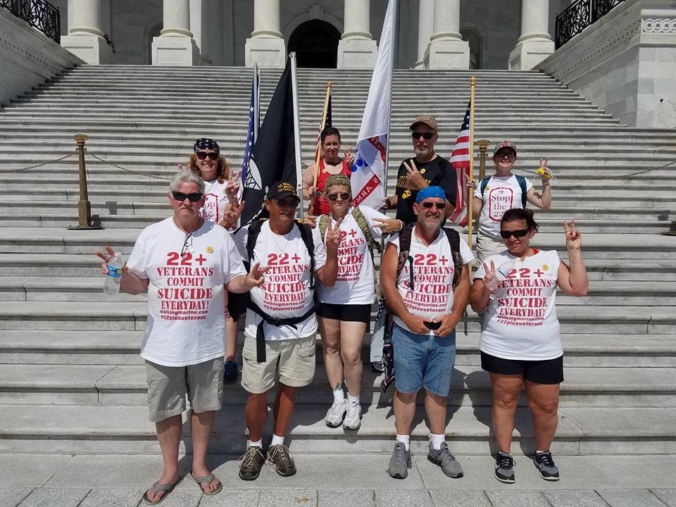 The Walking Marine crew posing in front of the capital building